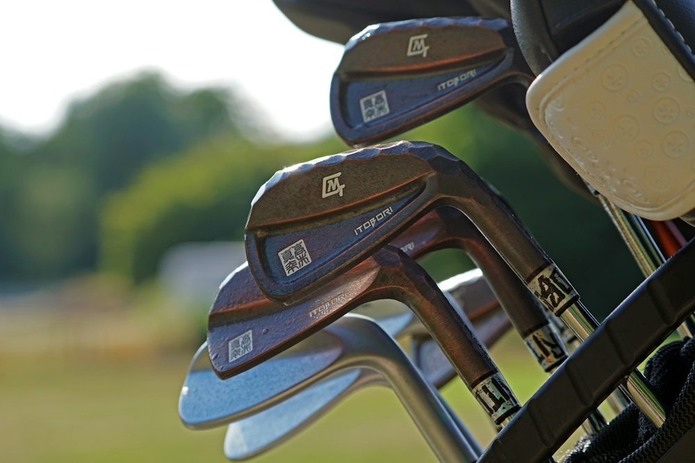 Irons in a golf bag (stock photo)